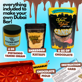 Everything included to make a Dubai chocolate bar: mold, chocolate, shredded kataifi, pistachio tahini cream, and instruction card